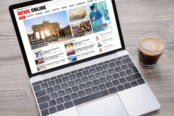Sample,News,Website,Opened,On,Laptop’s,Screen.,All,Contents,On